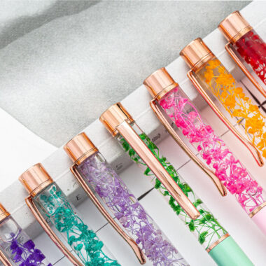 Custom aluminum ballpoint pen with 1.0mm tip and dried flowers for promotional gifts