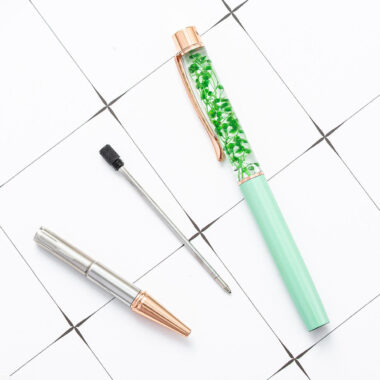 Custom aluminum ballpoint pen with 1.0mm tip and dried flowers for promotional gifts